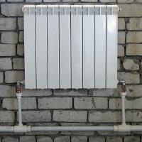 Ang isang-pipe na sistema ng pag-init ng isang pribadong bahay: mga scheme + isang pangkalahatang-ideya ng mga pakinabang at kawalan