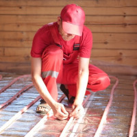 Δάπεδο ζεστού νερού σε μια ιδιωτική κατοικία: διαγράμματα, κανόνες συσκευής + οδηγίες εγκατάστασης
