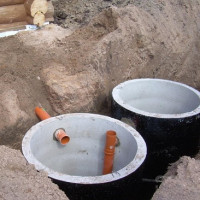 Organisation d'un puisard avec trop-plein: schémas et technologie de construction