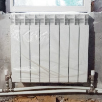 Pagkonekta ng isang radiator ng pagpainit sa isang sistema ng dalawang pipe: pagpili ng pinakamahusay na pagpipilian ng koneksyon