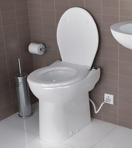 Cuvette de WC avec pompe hacheuse intégrée Cuvette de WC avec pompe intégrée