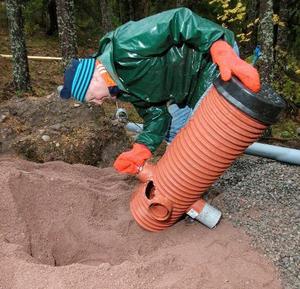 Installing a plastic well for drainage Installation of construction