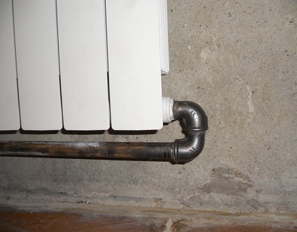 Devices of the heating system Leningradka with a metal pipe Metal Pipe Battery