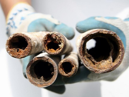 What is the flushing of the heating system for?