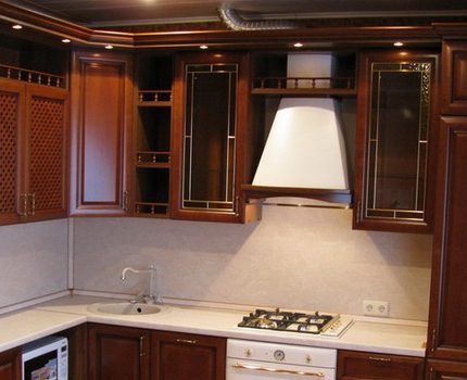 Aluminum corrugation on the background of an expensive kitchen set