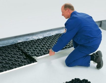 Pose de tapis pour le chauffage par le sol Pose de tapis