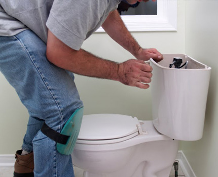 Classic toilet bowl with traditional fittings Toilet flush tank