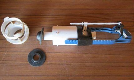 Lock-drain toilet device disassembled for DIY repair Tank shut-off valve