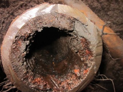Clogged cast iron toilet pipe - what to do Cast iron pipe clogging