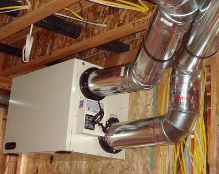 Ficha externa de recuperação de calor no circuito de ventilação Eficiência do recuperador