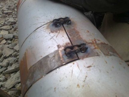 Paano mag-install ng isang pinto sa isang makeshift stove mula sa isang silindro ng gas Hinges para sa pintuan