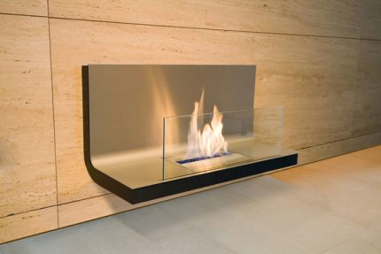 Open fireplace with a protective screen Open fireplace with a protective screen