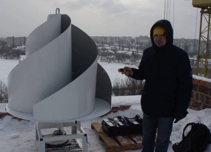 Vertical wind generator on the roof of an apartment building Vertical wind generator on the roof of an apartment building
