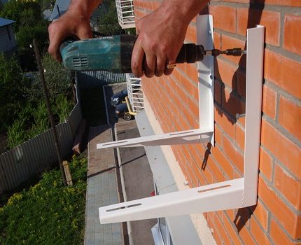 Do not hold the outdoor unit by the intake grille External block mount