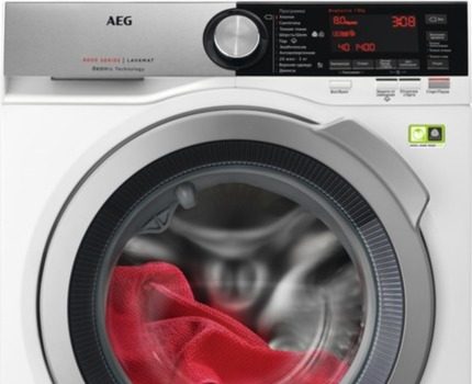 AEG veļas mazgājamās mašīnas parasti ir baltas vai sudrabpelēkas Modelis AEG L7FBE48