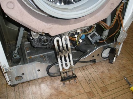 Repair of the heater of the washing machine Dismantling the heating element of the washing machine
