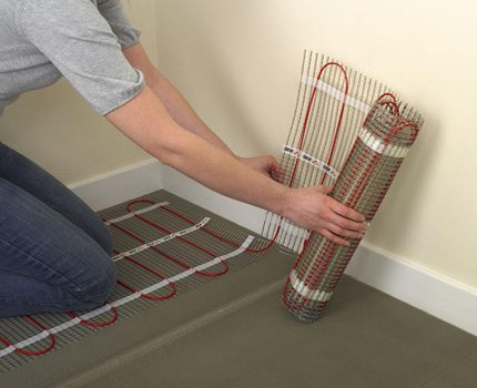 Caractéristiques de la pose de tapis électriques au sol dans la salle de bain Installation de tapis électriques
