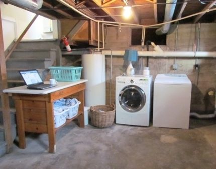 Washing machine in the basement of a private house Washing machine in the basement of a private house