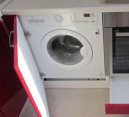Installing a built-in washing machine in the kitchen Built-in compact washer installation option