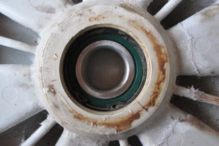 Rust on the drum of a washing machine Pockets of rust in household appliances