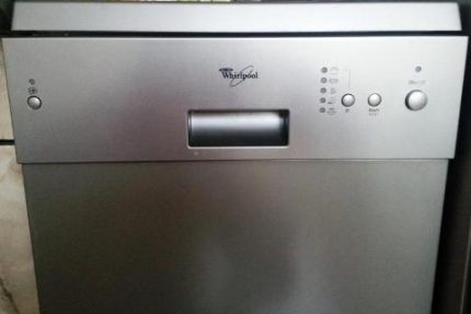 Dishwasher control panel with buttons Partially mechanical control