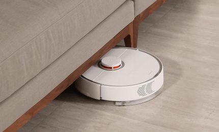 Robot vacuum cleaner during cleaning Robot vacuum cleaner under furniture