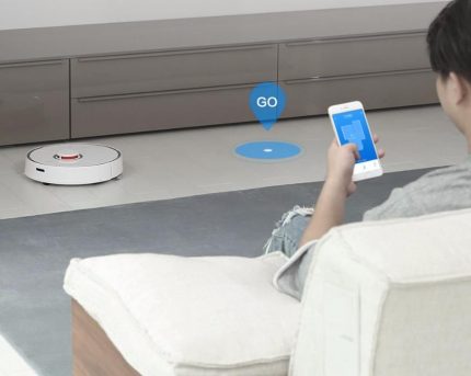 Choosing a program to start a robotic vacuum cleaner Programmable robot vacuum cleaner