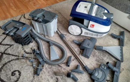 The washing vacuum cleaner with working nozzles in a complete set Vacuum cleaner and accessories