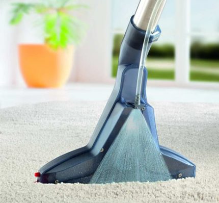 Cleaning the coating with a shampoo and vacuum cleaner Shampoo for a washing vacuum cleaner