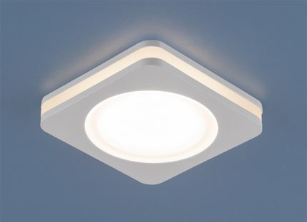 Places of installation of fixtures in a suspended canvas are planned in advance Type of spotlight after installation in the canvas