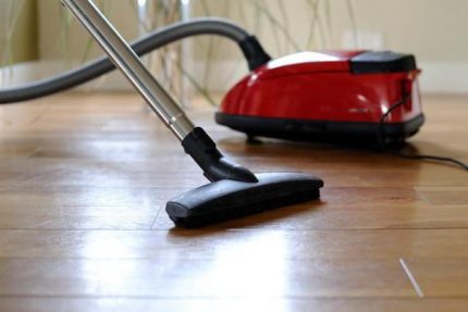 The brush leaves no marks on the smooth surface of the floor Miele brand vacuum cleaner on the floor