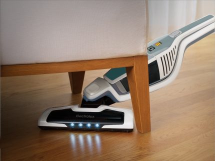 How a cordless vacuum cleaner from Electrolux cleans under the sofa Vacuuming under furniture