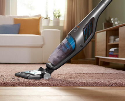 Cleaning the apartment with a vertical vacuum cleaner Inexpensive vacuum cleaner