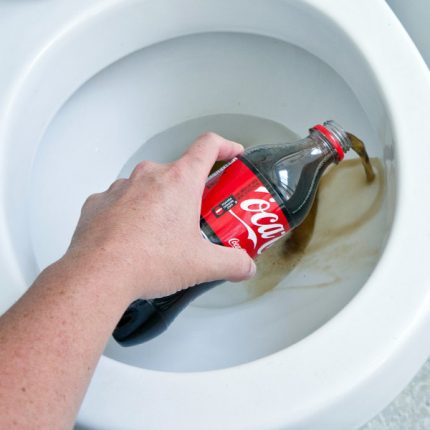 Cleaning the toilet with cola Coca Cola