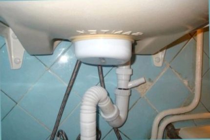 Conventional tubular siphon under the sink Siphon after cleaning