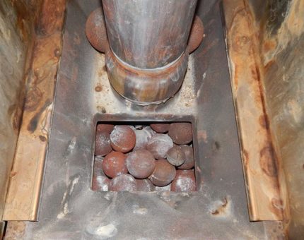 L’ús de nuclis de ferro colat com a pedres Nucles de ferro colat al forn