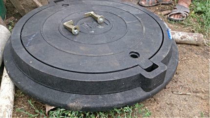 Preparing for mounting the hatch Sewer manhole