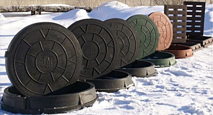 Different types of sewer covers Sewer manholes in the snow
