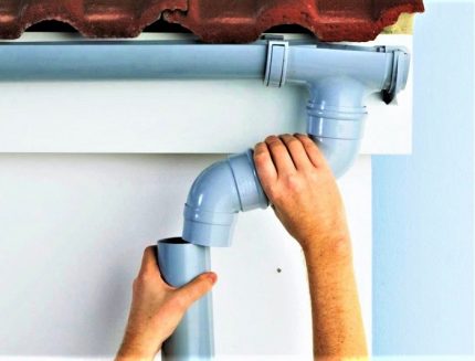 Mounting the elbow adapter to the pipe Knee to go to the drain