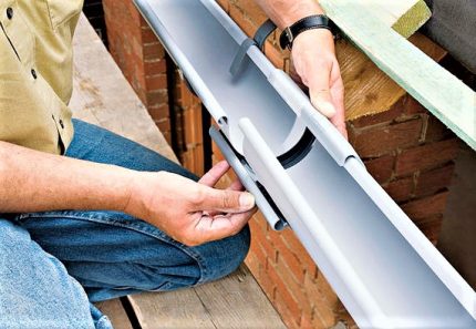 The connector is coated with glue before installation. Gutter connector