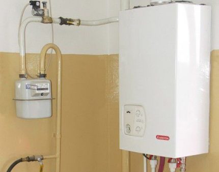 Wall mounted boiler and gas meter Wall mounted boiler and gas meter