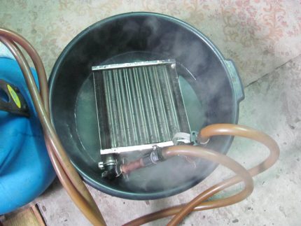Flushing ang boiler heat exchanger Ang pag-flush ng heat exchanger sa isang kemikal na solusyon