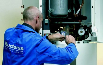 The master repairs the boiler Buderus The master repairs the boiler Buderus