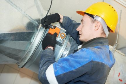 A specialist examines the duct using special video equipment