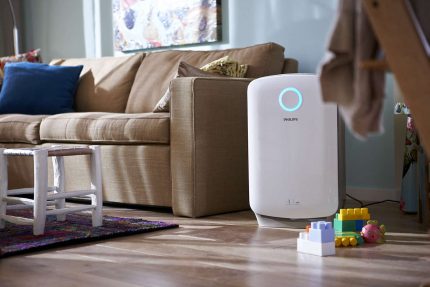 Humidifier near a brown sofa